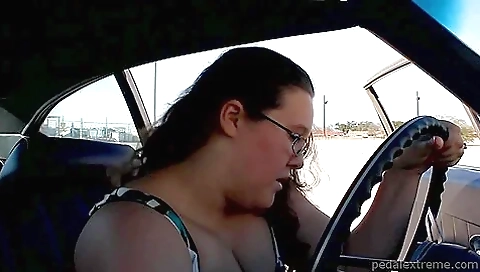 Robust Woman With Black Heels Tries Hard To Start Her Car With No Success Robust Woman With Black Heels Tries Hard To Start Her Car With No Success