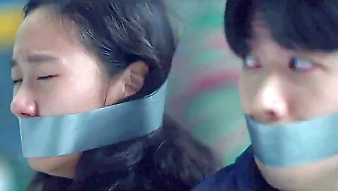 Korean Woman And Man Wraparound Tape Gagged Korean Woman And Man Wraparound Tape Gagged